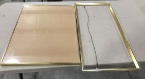 Two Gold Color Frames