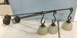 Three Hanging Light Fixtures