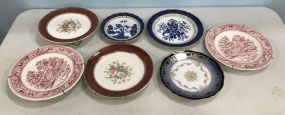 Seven Hand Painted Collectible Plates