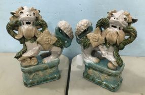 Pair of Pottery Foo Dog Statues