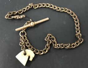 Circa 1900 Victorian Era Fontneau & Clock Company Gold Filled Watch Chain with Celluloid Horse Fob