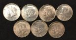 Seven 1964 Kennedy Half Dollar Coins