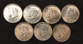 Seven 1964 Kennedy Half Dollar Coins