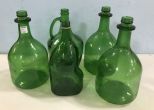 Five Vintage Green Glass Jugs
