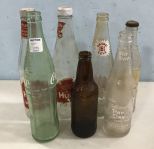 Seven Vintage Glass Bottles