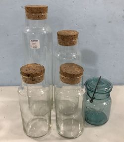 Four Clear glass Containers and Ball Jar