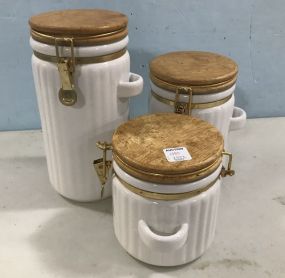 Three White Ceramic Canisters