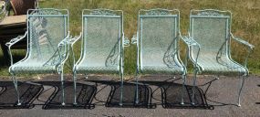 Four Wrought Iron Patio Arm Chairs