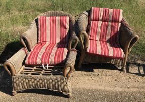 Two Tan Wicker Arm Chairs and Ottoman