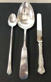 Sterling Handled Butter Knife, David Carlson Sterling Serving Spoon, and Sterling Royal Crest Iced Tea Spoon