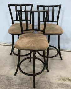 Three Metal Swivel Bar Stools