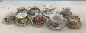 Nine Demi Tasse Porcelain Sets