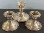 Three Weighted Sterling Candle Holders