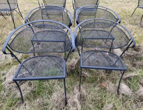 Four Wrought Iron Patio Arm Chairs