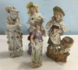 Four Bisque Porcelain Lady Figurines