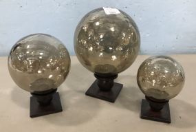 Three Decorative Glass Ball Plaques