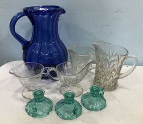 Clear Glass Pitcher, Blue Glass Water Pitcher, and Small Blue Candle Sticks