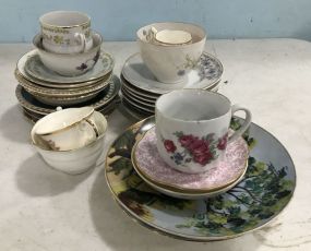 Group of Porcelain Plates and Saucers