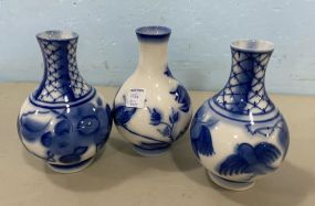 Three Small Oriental Blue and White Vases