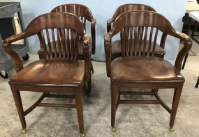 Four Vintage Mahogany Office Chairs
