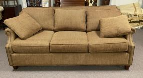 Three Cushion Upholstered Sofa