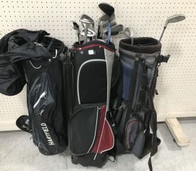 Three Golf Bags with Different Style Clubs
