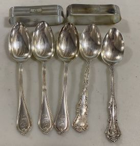 Five Sterling Spoons and Two Sterling Napkin Rings