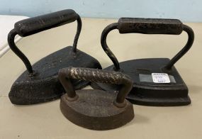 Three Antique Press Irons