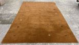 Woven Burnt Orange Area Rug