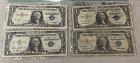 Four 1957 Dollar Blue Seat Notes