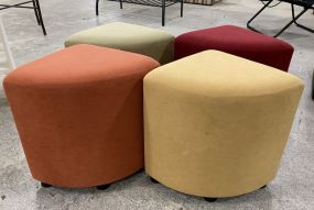 Four Multi Color Upholstered Stools