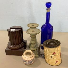 Bombay Wood Column Bookends, Blue Glass Decanter, Resin Candle Holders, Southwest Pottery Vase, and sifter