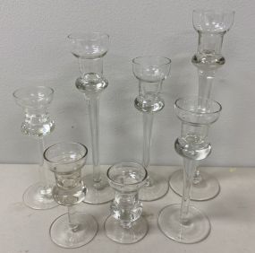 Seven Clear Glass Candle Sticks