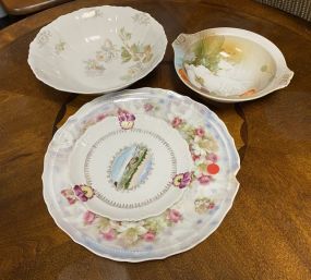 Four Porcelain Charger and Plates