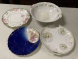 Three Porcelain Plates and Bowl
