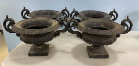 Four Matching Cast Iron Urn Planters