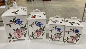 Four Porcelain Spice Canisters
