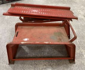 Two Red Metal Car Ramps