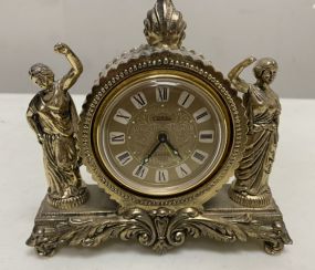 Small Carol Brass Figural Clock