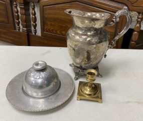 Metal Cheese Dome, Silver Plate Pitcher and Brass Candle Stick