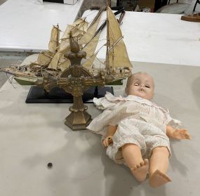 Damaged Collectible Ship, Vintage Doll, and Cross