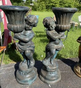 Pair of Metal Cherub Style Statues