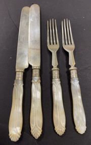 Four Silver Plate Knives and Forks