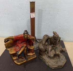 Two Vintage Metal Bookends and Antique Candle Stick