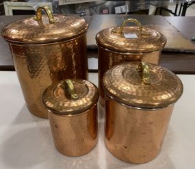 Four Brass Canisters