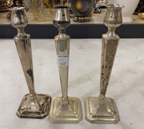 Three Weighted Sterling Candle Sticks