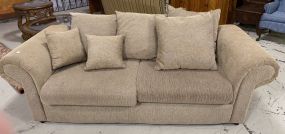 Tan Upholstered Two Cushion Sofa