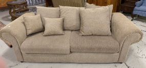 Tan Upholstered Two Cushion Sofa
