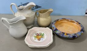 Pottery Pitchers, Plates, and Porcelain Bowl