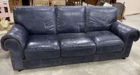 Large Blue Leather Three Cushion Sofa